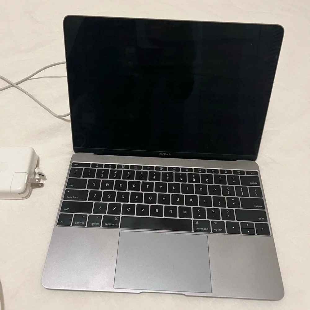 Apple MacBook Air 12” Laptop with Charger and Black Case
